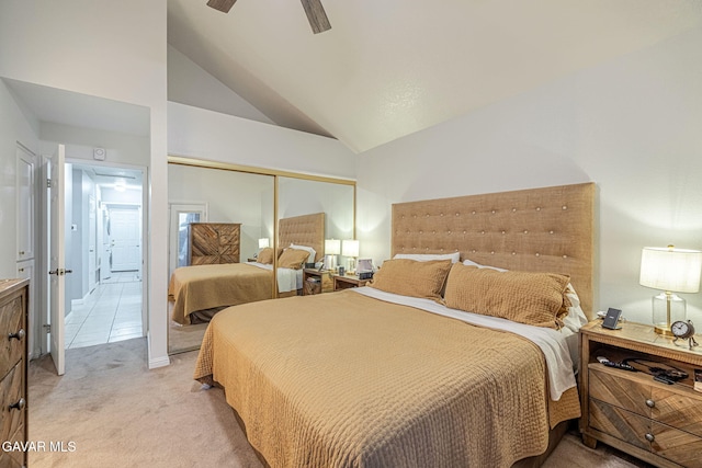 6015 Country Ln, Quartz Hill, CA 93536 - bedroom with light carpet, vaulted ceiling, a closet, and a ceiling fan