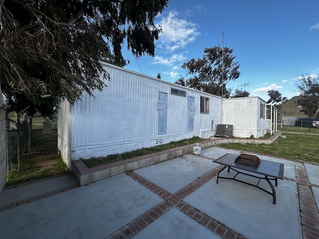 exterior space with a yard and a patio