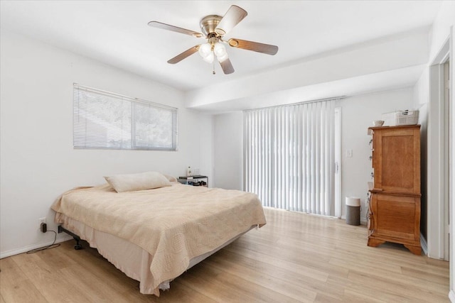 bedroom featuring ceiling fan and light wood-type flooring