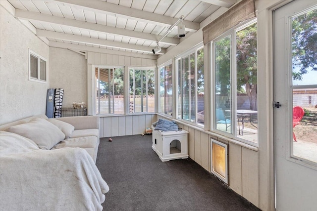 sunroom / solarium with beamed ceiling and wood ceiling