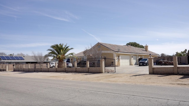 single story home featuring a garage