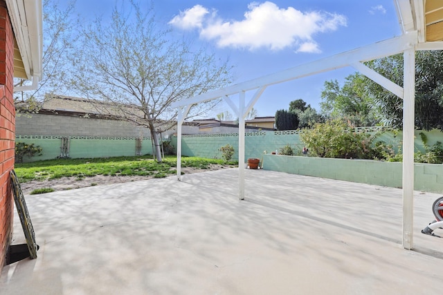 view of patio with a fenced backyard