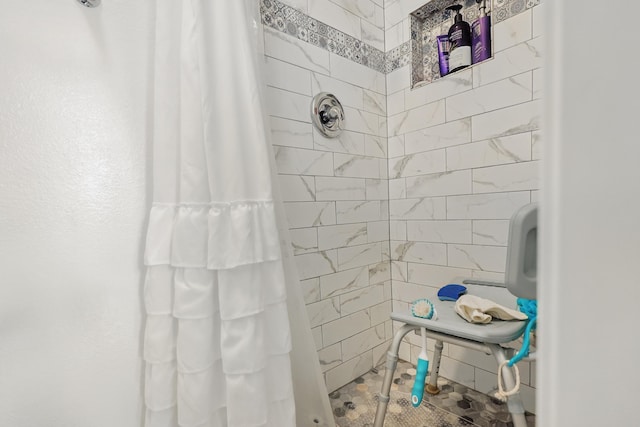 bathroom featuring a stall shower