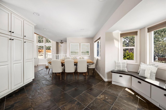 24500 Deertrail Dr, Tehachapi, CA 93561 - dining area featuring baseboards and stone tile floors
