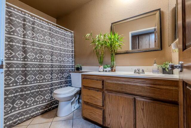43841 E 30th St, Lancaster, CA 93535 - full bathroom featuring vanity and tile patterned flooring