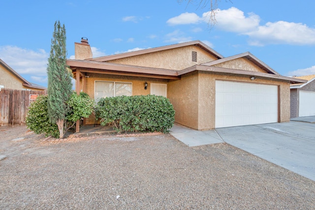 single story home featuring a garage