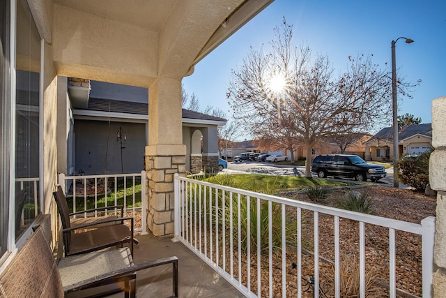 balcony featuring covered porch