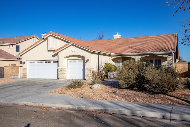 view of front of property featuring a garage