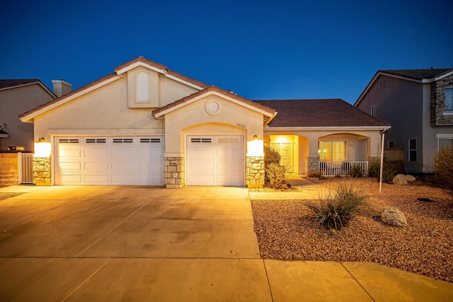 view of front of home featuring a garage