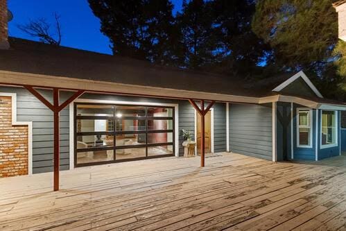 view of deck at twilight