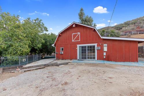 view of outbuilding featuring a mountain view