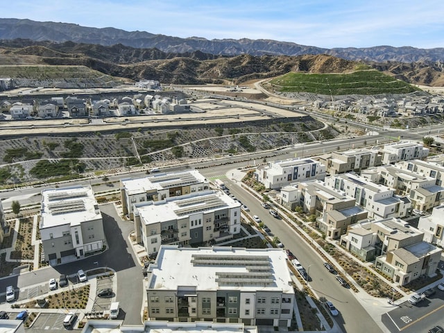 birds eye view of property featuring a mountain view