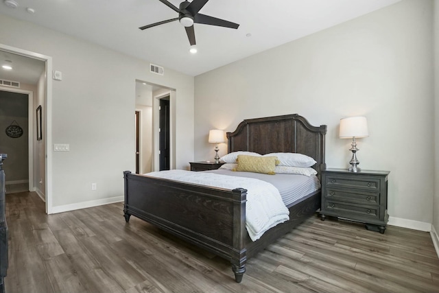 bedroom featuring dark wood-type flooring and ceiling fan