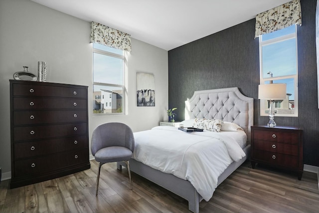 bedroom with hardwood / wood-style floors