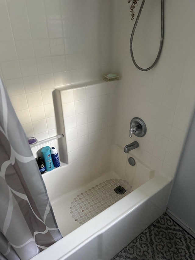 bathroom featuring shower / bath combo