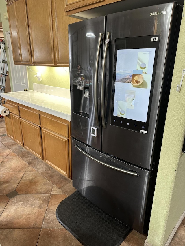 kitchen with stainless steel fridge