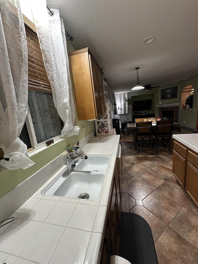 bathroom featuring vanity and a textured ceiling