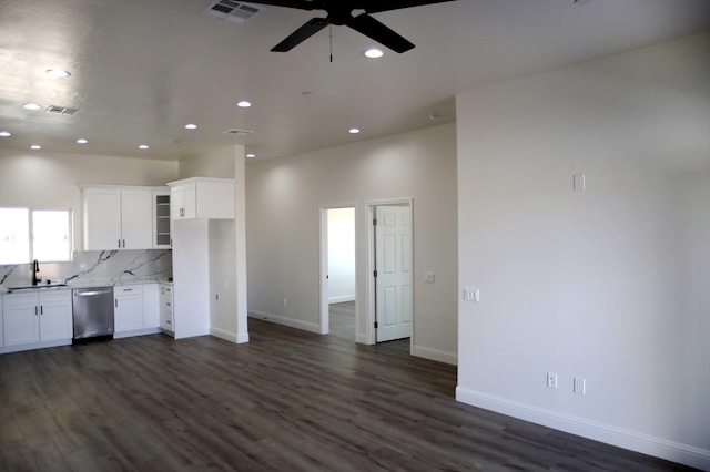 kitchen with visible vents, backsplash, dishwasher, white cabinetry, and a ceiling fan