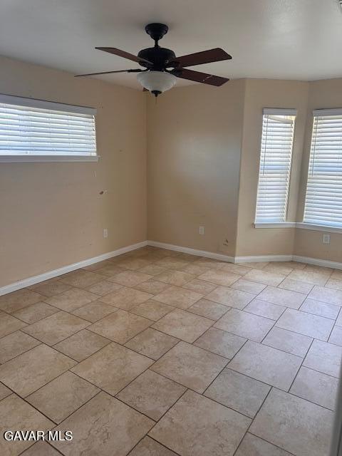 4961 Montiverde Rd, Mojave, CA 93501 - spare room featuring a ceiling fan and baseboards