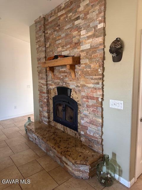 4961 Montiverde Rd, Mojave, CA 93501 - detailed view of a stone fireplace and baseboards