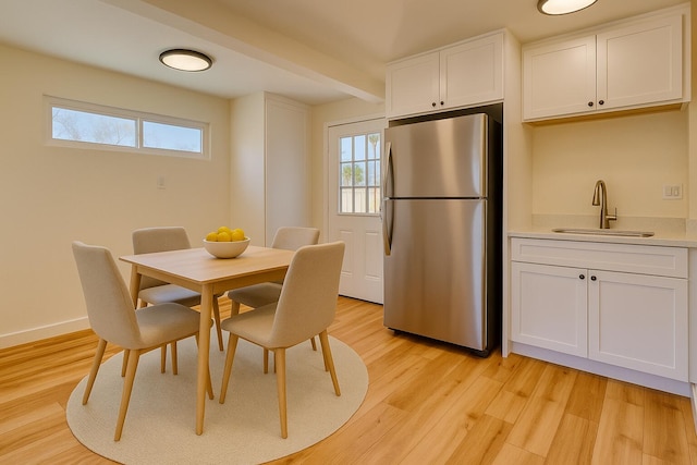 2068 Elm St, Rosamond, CA 93560 - dining area featuring light wood-type flooring