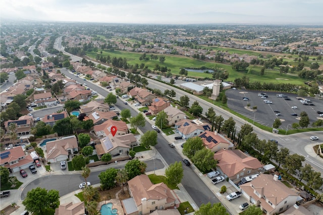 bird's eye view with a residential view and view of golf course