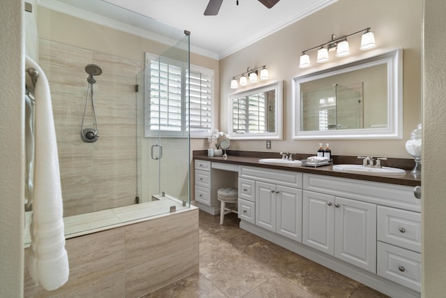bathroom with a sink, crown molding, ceiling fan, double vanity, and tiled shower