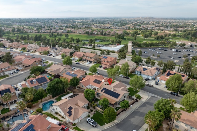 birds eye view of property with a residential view
