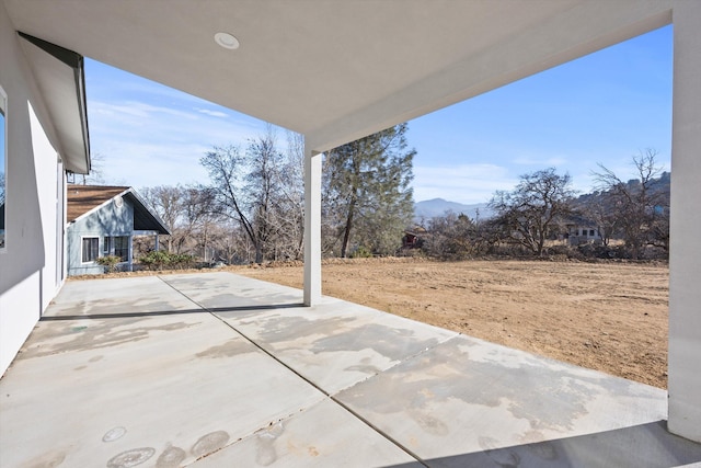 view of patio featuring a mountain view