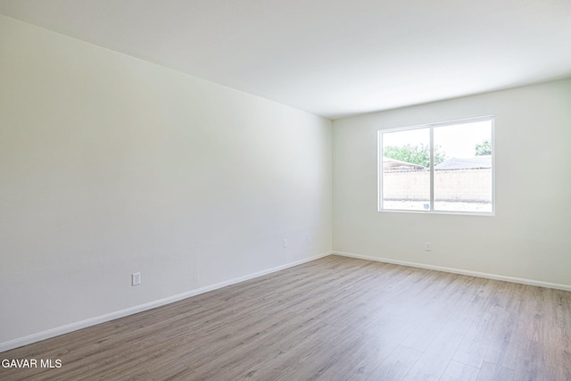 38537 E 37th St, Palmdale, CA 93550 - empty room featuring wood finished floors and baseboards