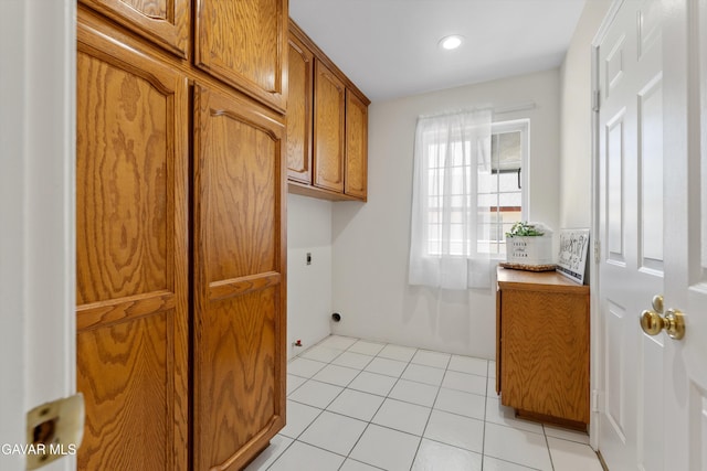 22401 Citation St, Tehachapi, CA 93561 - washroom with hookup for an electric dryer, light tile patterned floors, cabinet space, and recessed lighting