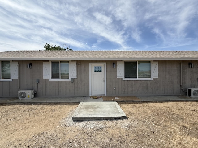 2202 E Lancaster Blvd, Lancaster, CA 93535 - view of front of property featuring a cooling unit and roof with shingles