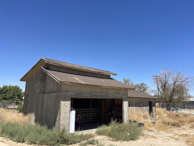2202 E Lancaster Blvd, Lancaster, CA 93535 - view of property exterior with an outbuilding