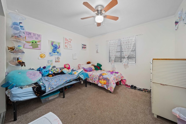 bedroom with carpet, ceiling fan, and crown molding