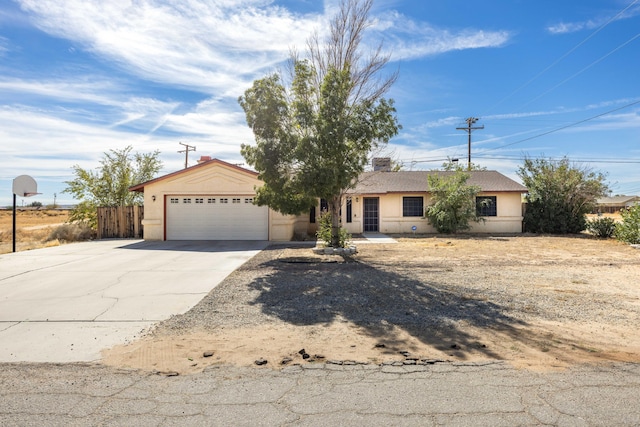 ranch-style home with a garage