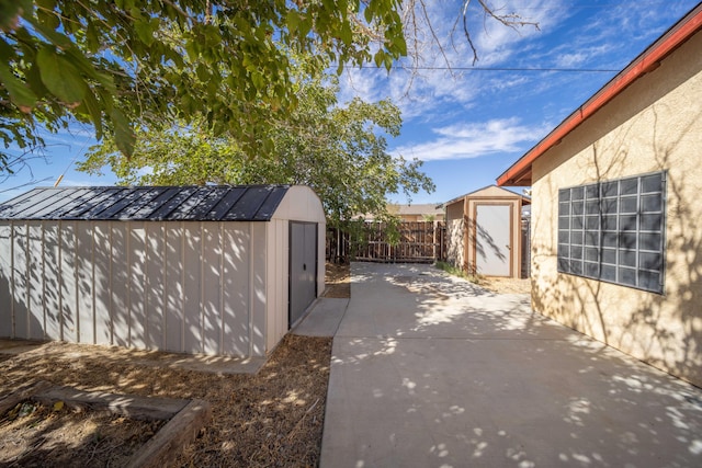 exterior space featuring a storage shed