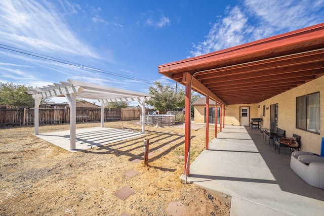 view of yard featuring a pergola and a patio