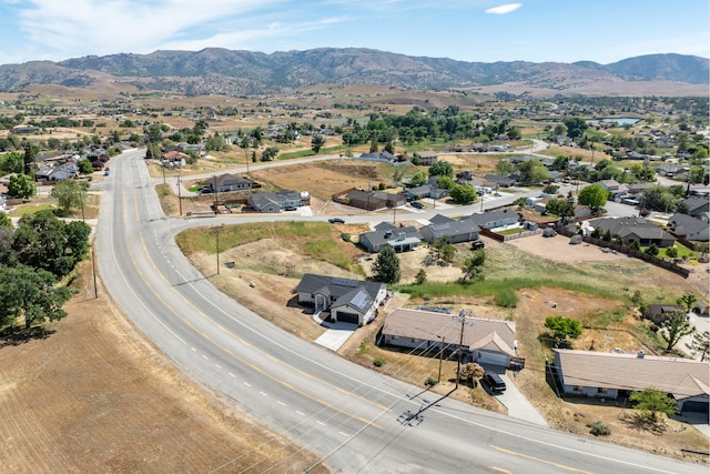 aerial view of residential area with a mountain backdrop