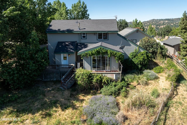 24750 Flatiron Ct, Tehachapi, CA 93561 - back of property featuring a wooden deck