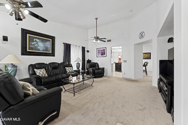 3267 Desert Cloud Ave, Rosamond, CA 93560 - living room featuring ceiling fan and carpet