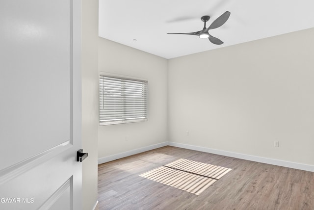 9207 Margery Ave, California City, CA 93505 - empty room with wood finished floors and ceiling fan