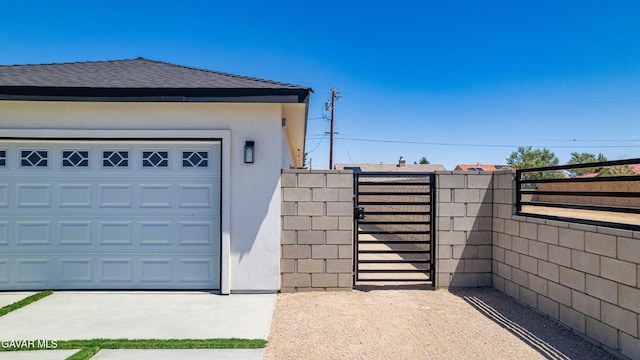 9207 Margery Ave, California City, CA 93505 - garage with a gate