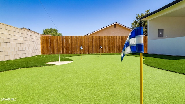 9207 Margery Ave, California City, CA 93505 - view of yard with a putting area