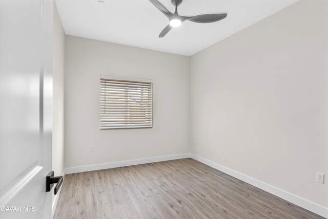 9207 Margery Ave, California City, CA 93505 - empty room with ceiling fan and wood finished floors