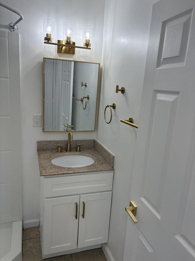 38810 Foxholm Dr, Palmdale, CA 93551 - bathroom with vanity, tile patterned floors, a shower, and baseboards