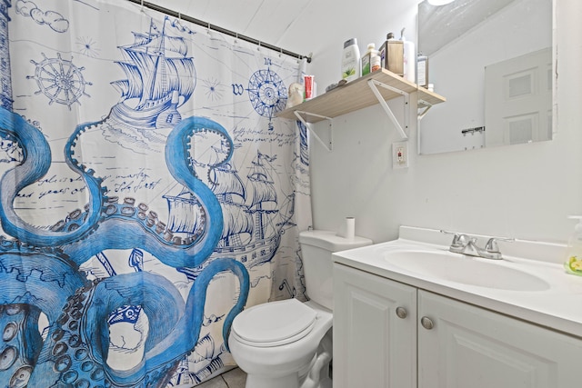 bathroom featuring toilet and vanity