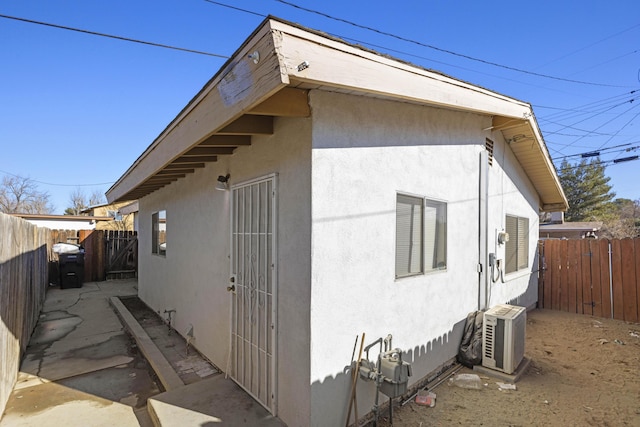 view of property exterior featuring ac unit