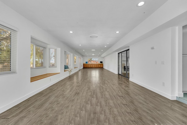 unfurnished living room featuring hardwood / wood-style floors