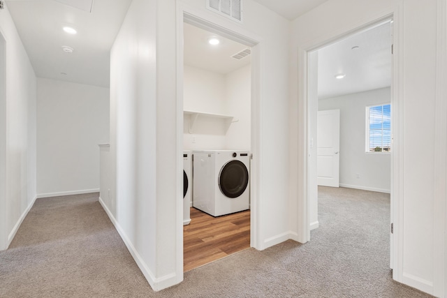 6018 Vespucci Ave, Bakersfield, CA 93313 - laundry area featuring carpet flooring, washer and dryer, baseboards, and recessed lighting