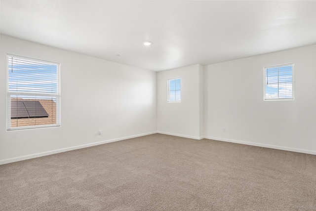 6018 Vespucci Ave, Bakersfield, CA 93313 - carpeted spare room with baseboards and recessed lighting